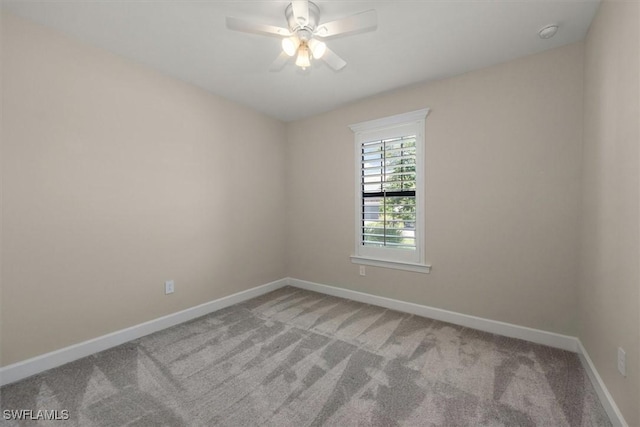 16176 Rosemallow Ln, Alva, FL 33920 - empty room with carpet, a smoke detector, and a ceiling fan