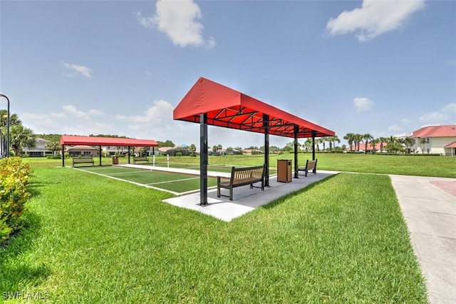 16176 Rosemallow Ln, Alva, FL 33920 - view of property's community with a bocce ball area and a lawn