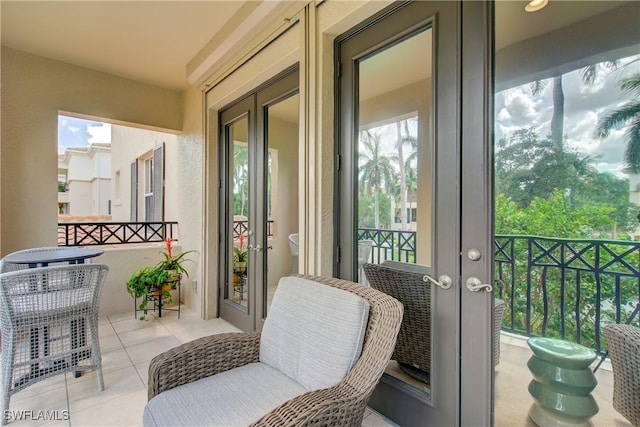 2855 Tiburon Blvd E Unit 102, Naples, FL 34109 - balcony featuring french doors