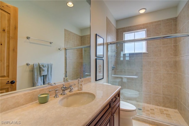 2855 Tiburon Blvd E Unit 102, Naples, FL 34109 - bathroom featuring vanity and a shower stall