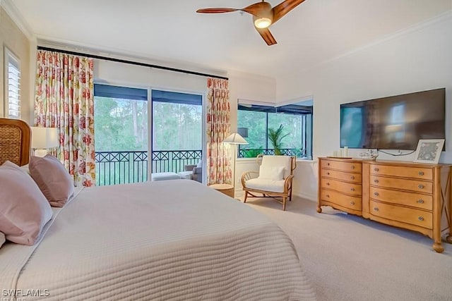 2855 Tiburon Blvd E Unit 102, Naples, FL 34109 - carpeted bedroom featuring access to exterior, multiple windows, ornamental molding, and a ceiling fan