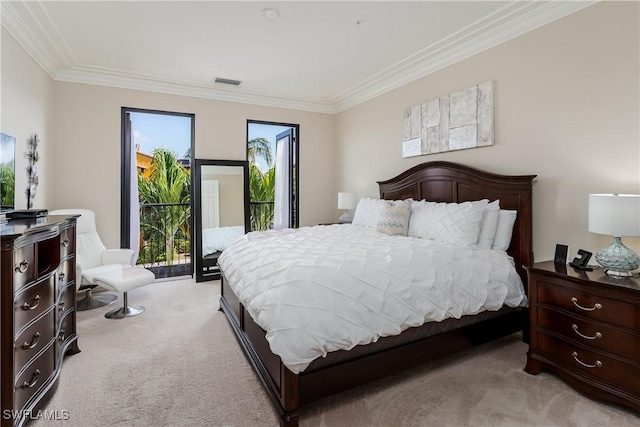 9051 Capistrano St N Unit 4302, Naples, FL 34113 - bedroom featuring light colored carpet, ornamental molding, and access to exterior