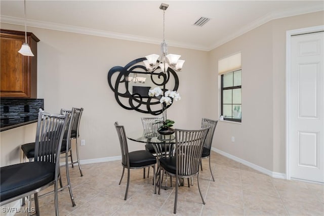9051 Capistrano St N Unit 4302, Naples, FL 34113 - dining area featuring ornamental molding, a chandelier, and light tile patterned flooring