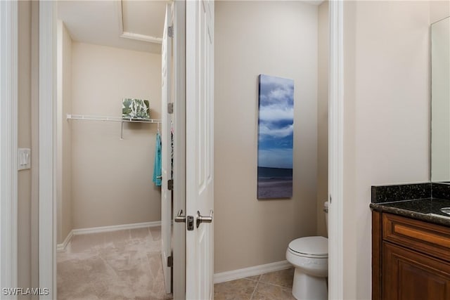 9051 Capistrano St N Unit 4302, Naples, FL 34113 - bathroom featuring vanity and toilet