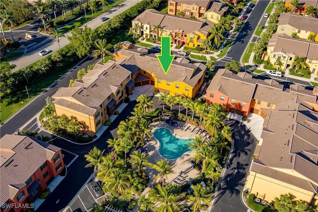 9051 Capistrano St N Unit 4302, Naples, FL 34113 - aerial perspective of suburban area featuring a pool