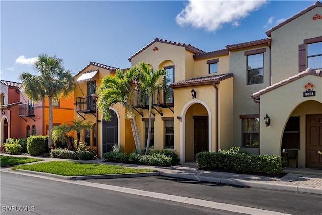 9051 Capistrano St N Unit 4302, Naples, FL 34113 - mediterranean / spanish home featuring stucco siding and a tiled roof