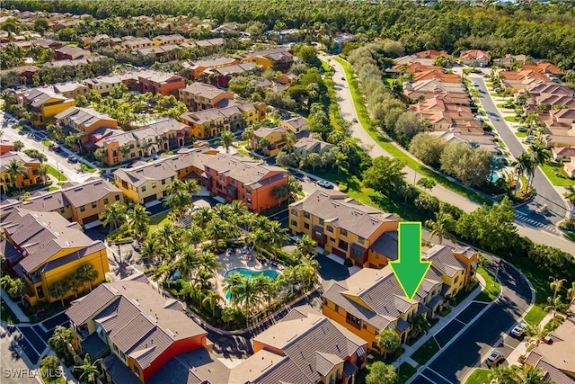 9051 Capistrano St N Unit 4302, Naples, FL 34113 - aerial perspective of suburban area with a pool area