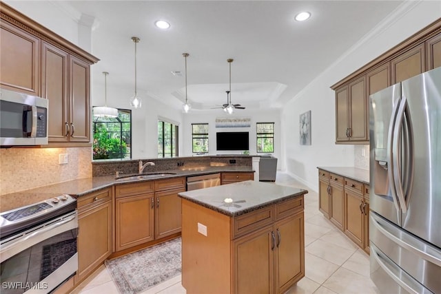 7327 Acorn Way, Naples, FL 34119 - kitchen featuring appliances with stainless steel finishes, a sink, ceiling fan, tasteful backsplash, and recessed lighting