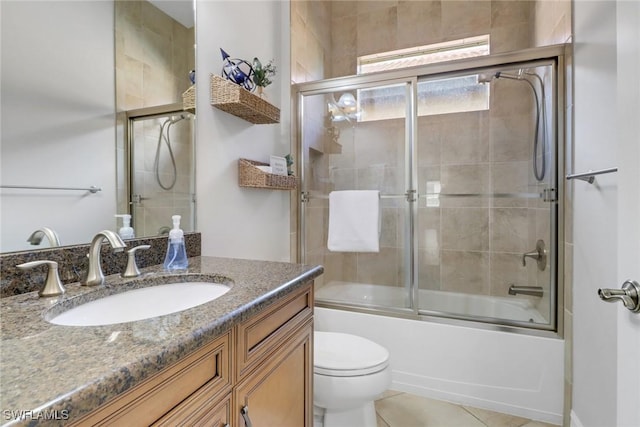 7327 Acorn Way, Naples, FL 34119 - full bathroom featuring vanity, toilet, and enclosed tub / shower combo