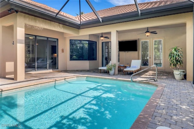 7327 Acorn Way, Naples, FL 34119 - swimming pool with french doors, a ceiling fan, a patio, and a lanai