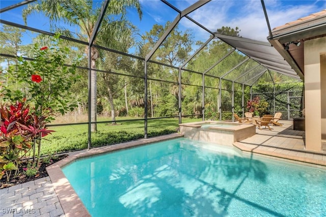 7327 Acorn Way, Naples, FL 34119 - view of pool featuring glass enclosure, a patio, and a pool with connected hot tub
