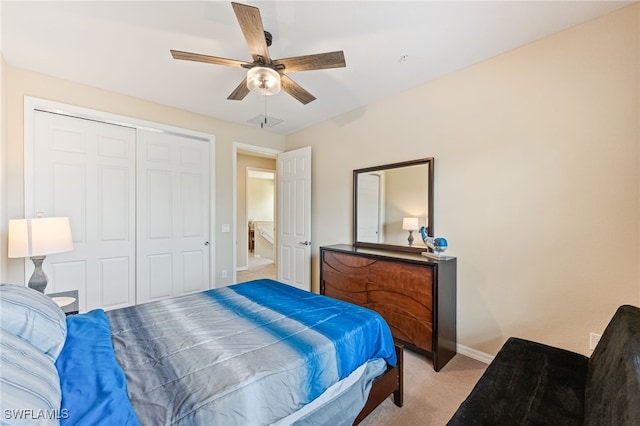 9063 Capistrano St N Unit 4401, Naples, FL 34113 - bedroom featuring light colored carpet, a closet, and a ceiling fan