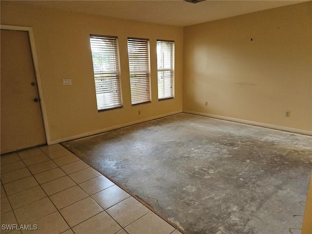 3616 SW 1st Pl, Cape Coral, FL 33914 - empty room featuring baseboards and concrete floors