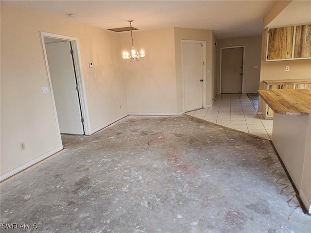 3616 SW 1st Pl, Cape Coral, FL 33914 - unfurnished dining area featuring a chandelier and baseboards