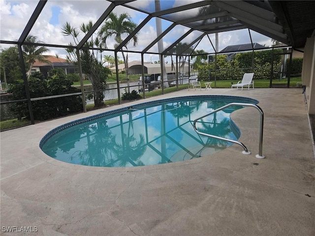 3616 SW 1st Pl, Cape Coral, FL 33914 - outdoor pool featuring a patio, a lanai, and a water view