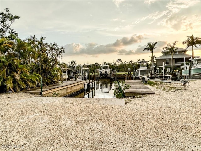 16750 Bocilla Palms Dr Unit 74, Bokeelia, FL 33922 - view of home's community featuring a water view and a boat dock