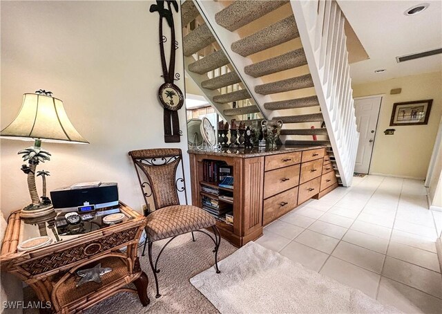 16750 Bocilla Palms Dr Unit 74, Bokeelia, FL 33922 - living area with stairs and light tile patterned floors