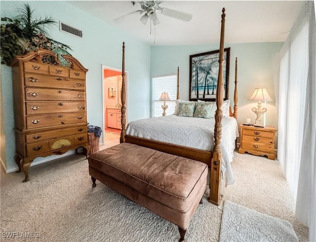 16750 Bocilla Palms Dr Unit 74, Bokeelia, FL 33922 - bedroom featuring carpet floors, ensuite bathroom, and ceiling fan