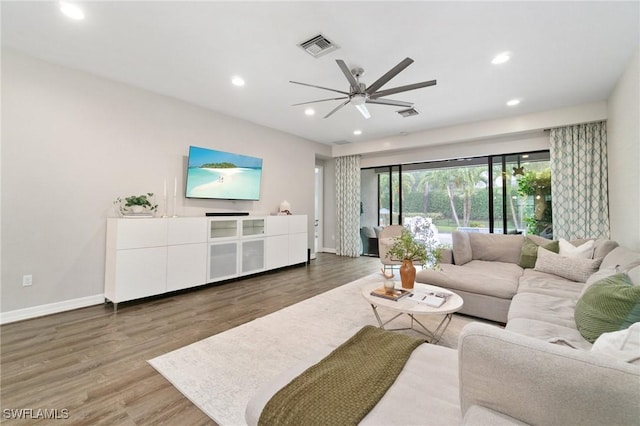 4119 Zelkova Ct, Naples, FL 34119 - living room with ceiling fan, wood finished floors, and recessed lighting