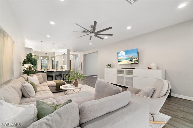 4119 Zelkova Ct, Naples, FL 34119 - living room with wood finished floors, recessed lighting, and a ceiling fan
