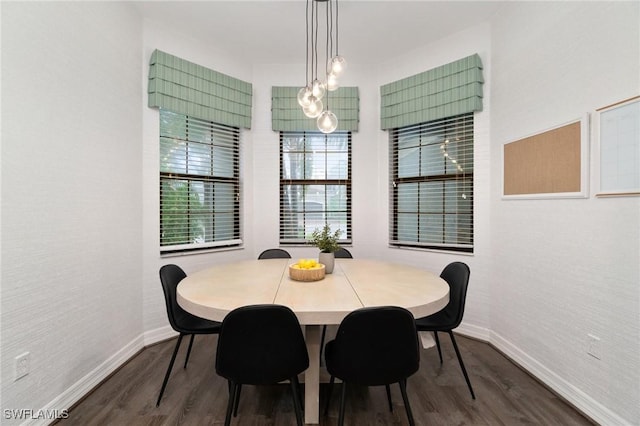 4119 Zelkova Ct, Naples, FL 34119 - dining area with dark wood-style flooring
