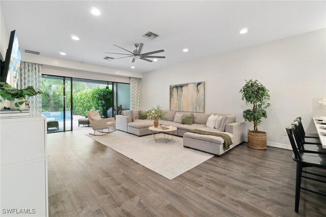 4119 Zelkova Ct, Naples, FL 34119 - living room featuring recessed lighting, wood finished floors, and ceiling fan