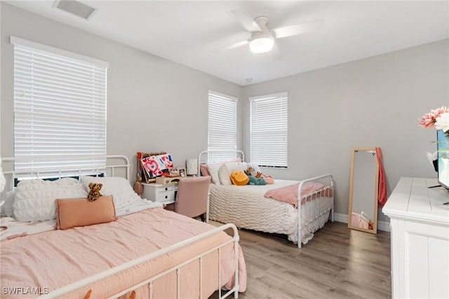 4119 Zelkova Ct, Naples, FL 34119 - bedroom featuring light wood-style flooring and ceiling fan