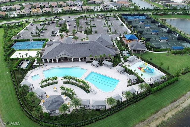 4119 Zelkova Ct, Naples, FL 34119 - aerial view of a pool area and a nearby body of water