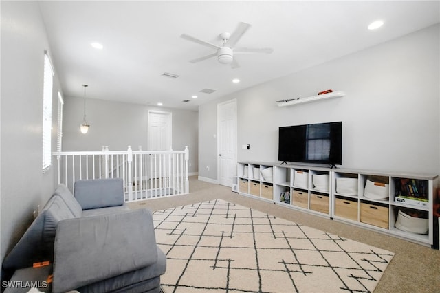 4119 Zelkova Ct, Naples, FL 34119 - living room with light carpet, ceiling fan, and recessed lighting