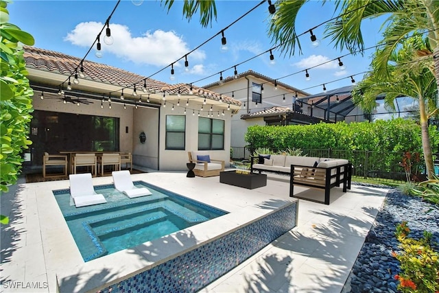 4119 Zelkova Ct, Naples, FL 34119 - back of property featuring outdoor lounge area, a jacuzzi, a tile roof, and a patio