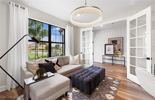 3706 Wild Sage Way, Alva, FL 33920 - living room featuring french doors and wood finished floors