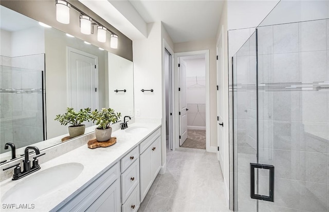 3706 Wild Sage Way, Alva, FL 33920 - bathroom with double vanity, a stall shower, and a spacious closet