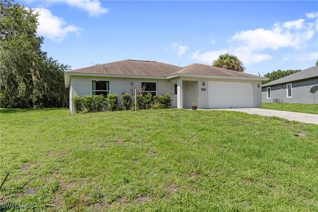 1429 Jabara Cir, Labelle, FL 33935 - ranch-style home featuring an attached garage, driveway, stucco siding, and a front lawn