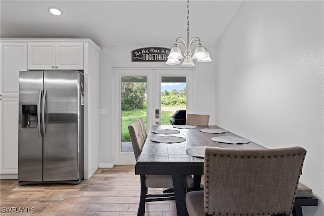 1429 Jabara Cir, Labelle, FL 33935 - dining space featuring a chandelier, light wood-style floors, french doors, and recessed lighting