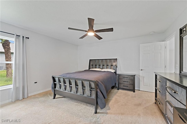 1429 Jabara Cir, Labelle, FL 33935 - bedroom featuring light colored carpet and ceiling fan