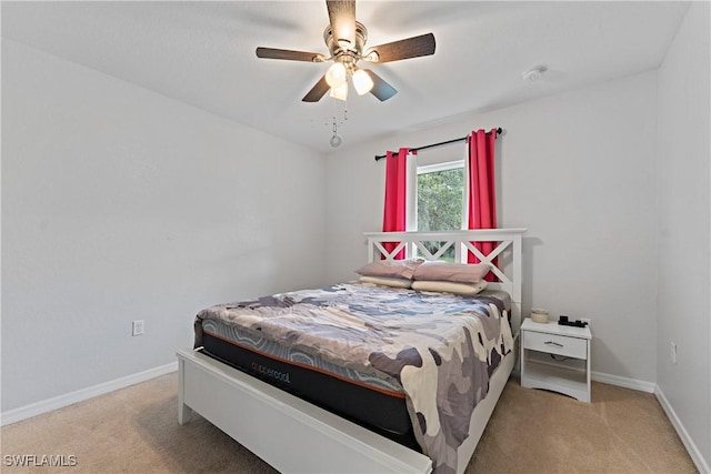 1429 Jabara Cir, Labelle, FL 33935 - carpeted bedroom featuring baseboards and ceiling fan
