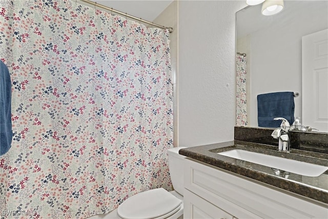 1429 Jabara Cir, Labelle, FL 33935 - full bath featuring vanity, curtained shower, and a textured wall