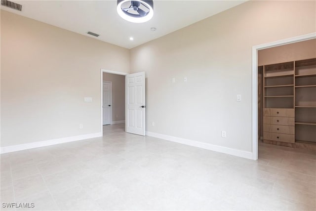 10295 Carolina St, Bonita Springs, FL 34135 - unfurnished bedroom with a spacious closet and a closet