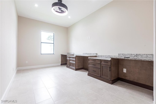 10295 Carolina St, Bonita Springs, FL 34135 - unfurnished office with light tile patterned floors and baseboards