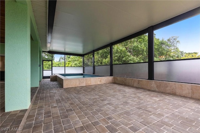 10295 Carolina St, Bonita Springs, FL 34135 - unfurnished sunroom with a hot tub
