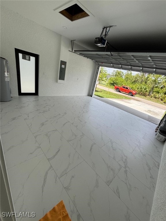2909 Dora Ave N, Lehigh Acres, FL 33971 - garage featuring a textured wall, electric panel, water heater, and a garage door opener