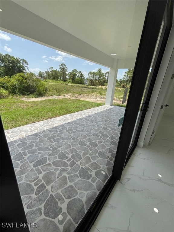 2909 Dora Ave N, Lehigh Acres, FL 33971 - view of patio / terrace