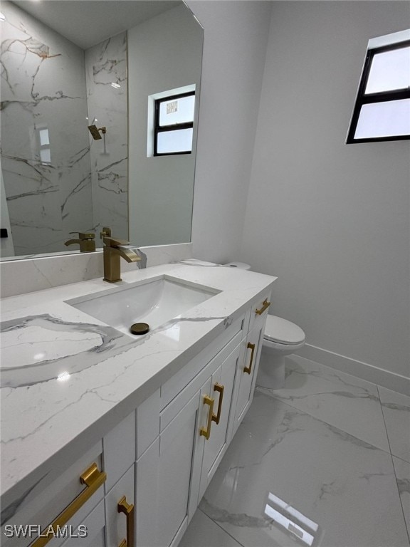 2909 Dora Ave N, Lehigh Acres, FL 33971 - full bathroom with marble look tile flooring, vanity, and a marble finish shower