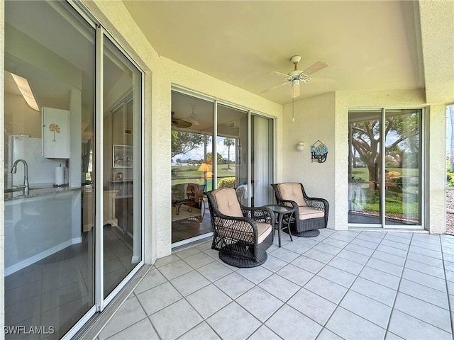 15054 Tamarind Cay Ct Unit 706, Fort Myers, FL 33908 - view of patio / terrace featuring a ceiling fan