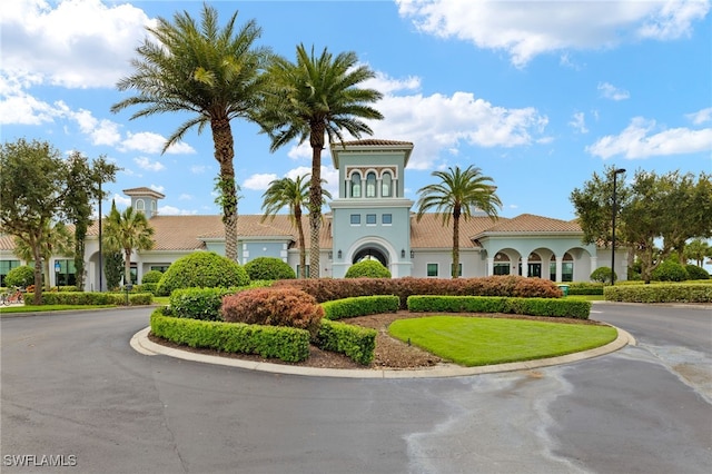 6334 Achievement Ave, Ave Maria, FL 34142 - view of building exterior with curved driveway