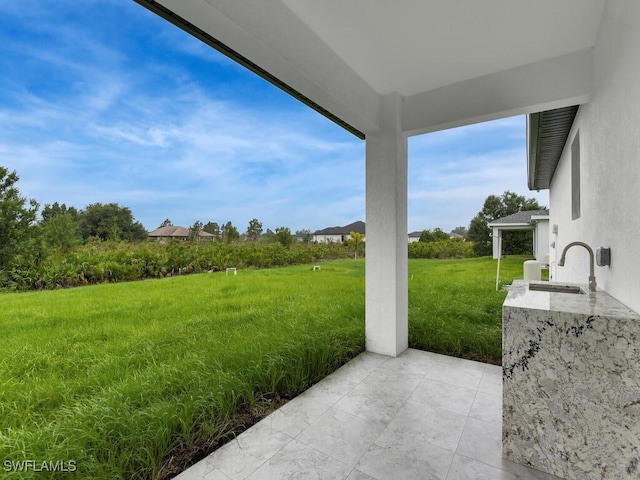 3301 8th St SW, Lehigh Acres, FL 33976 - view of grassy yard with a sink and a patio area