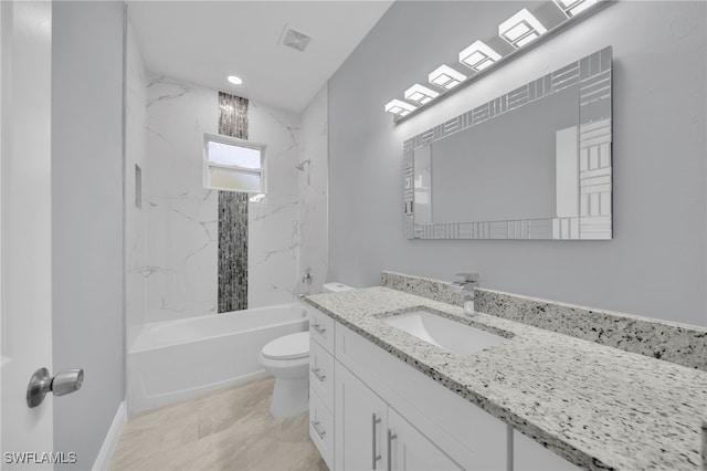 908 Barcia St E, Lehigh Acres, FL 33974 - bathroom featuring vanity, toilet, and shower / bathtub combination