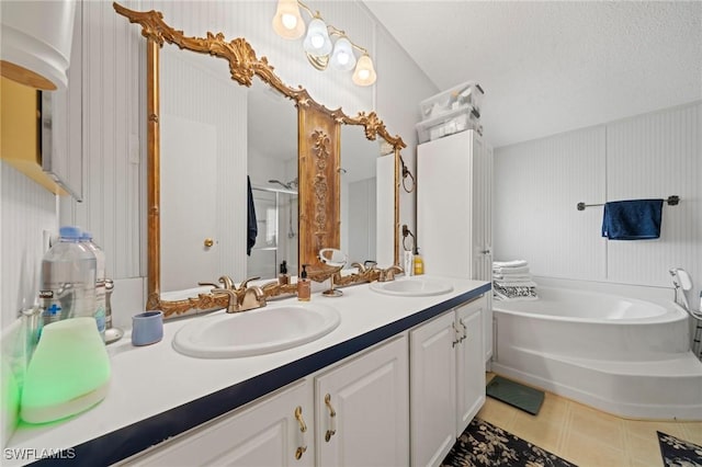 919 Manatee Rd, Naples, FL 34114 - bathroom featuring a bath, double vanity, a stall shower, and tile patterned floors
