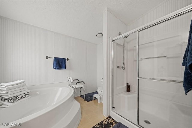 919 Manatee Rd, Naples, FL 34114 - full bathroom with a shower stall, a bath, a decorative wall, and tile patterned flooring