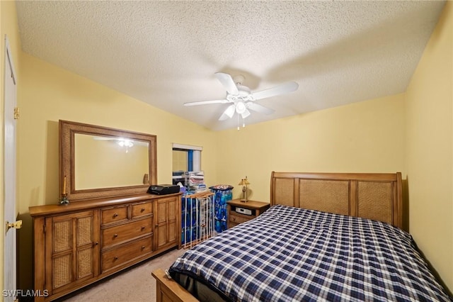 919 Manatee Rd, Naples, FL 34114 - bedroom with light carpet, a ceiling fan, and a textured ceiling